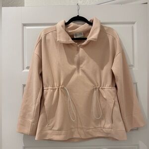Anthropologie athleisure quarter zip in salmon pink